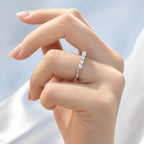 Selunyra Pinko white ring worn on hand