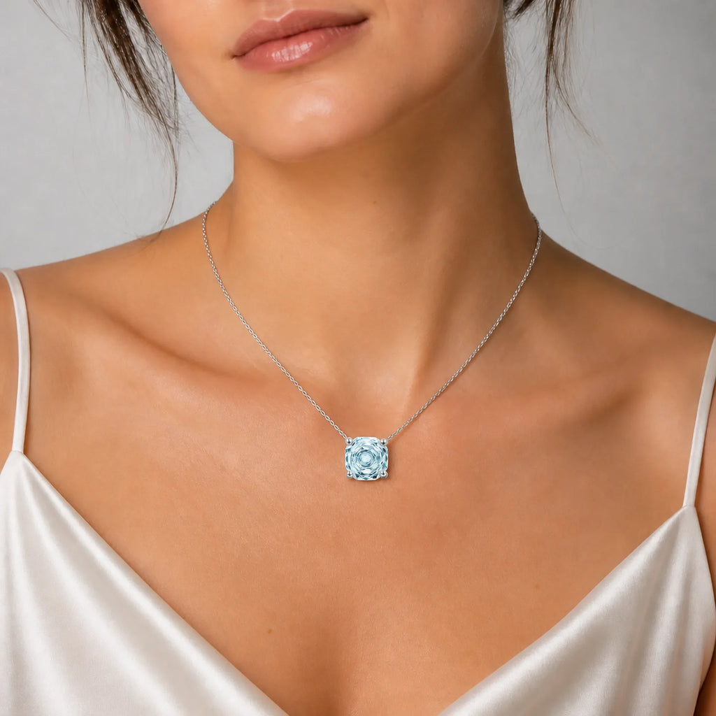 Selunyra Rose-Cut Blue D Necklace worn by model, studio view