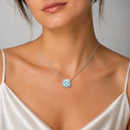 Selunyra Rose-Cut Blue D Necklace worn by model, studio view