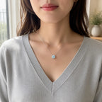 Selunyra Rose-Cut Blue D Necklace worn by model, lifestyle view