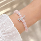 Selunyra Rose Quartz Bracelet worn on wrist