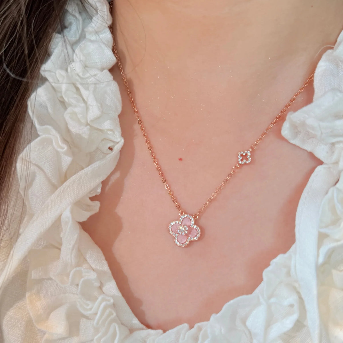 Selunyra Sakura Cleef Necklace worn with white blouse