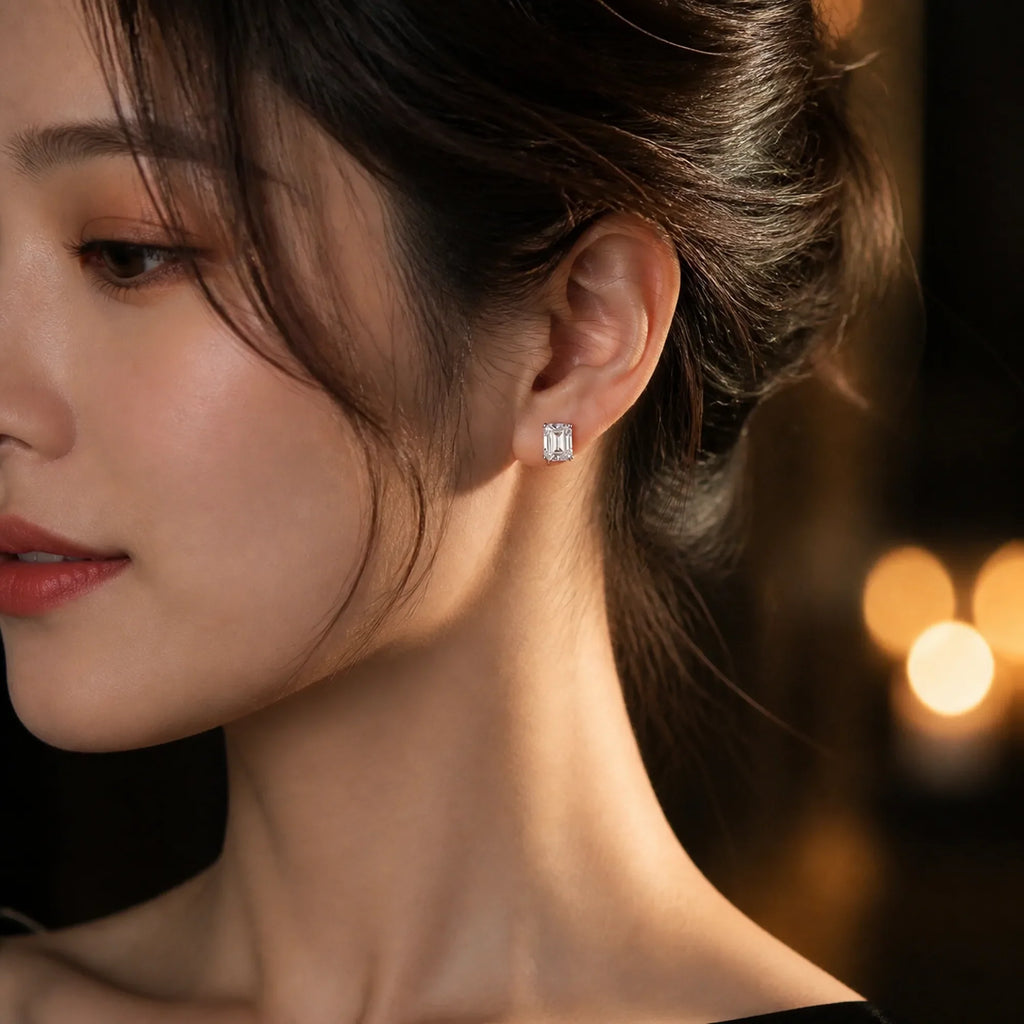 Selunyra Salia emerald-cut stud earring worn for evening