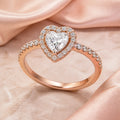 Selunyra rose gold sparkling heart ring on blush satin