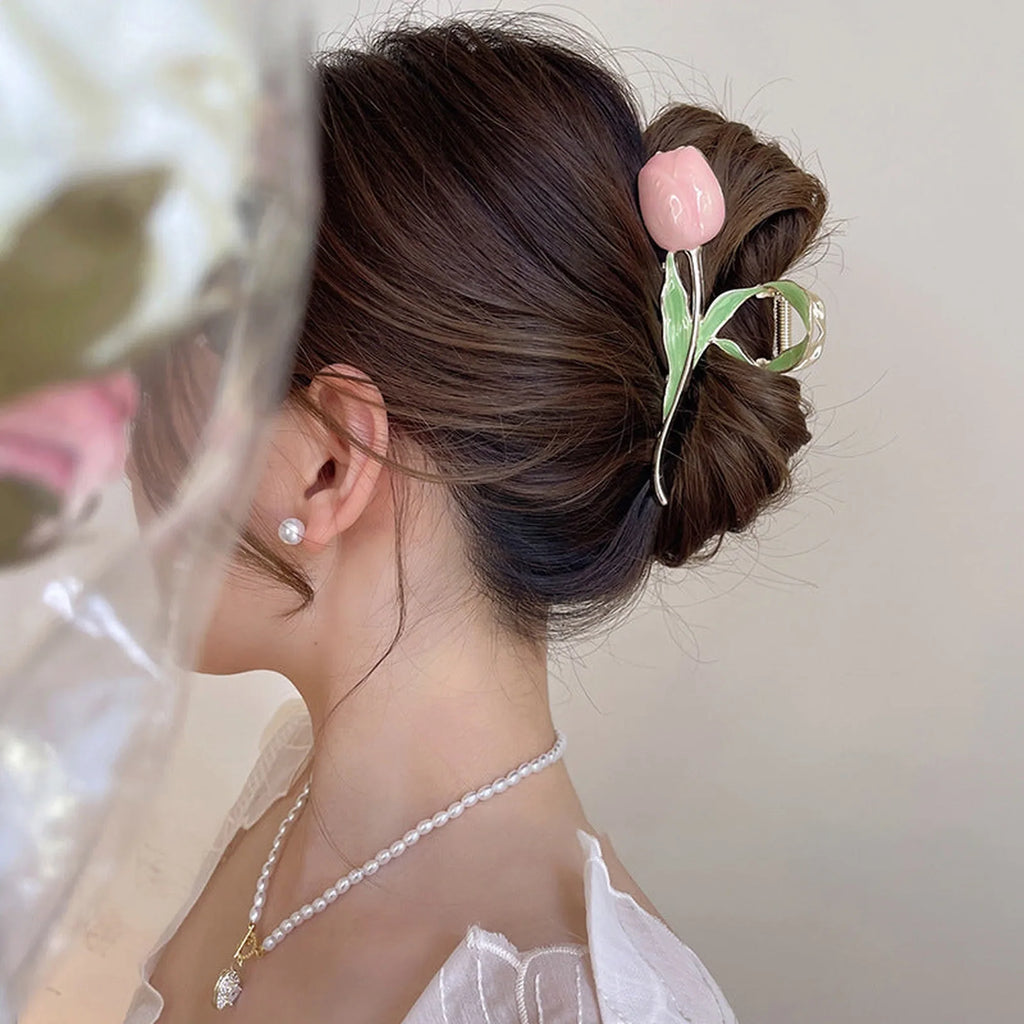 Selunyra pink Tulip Claw Clip in an elegant updo