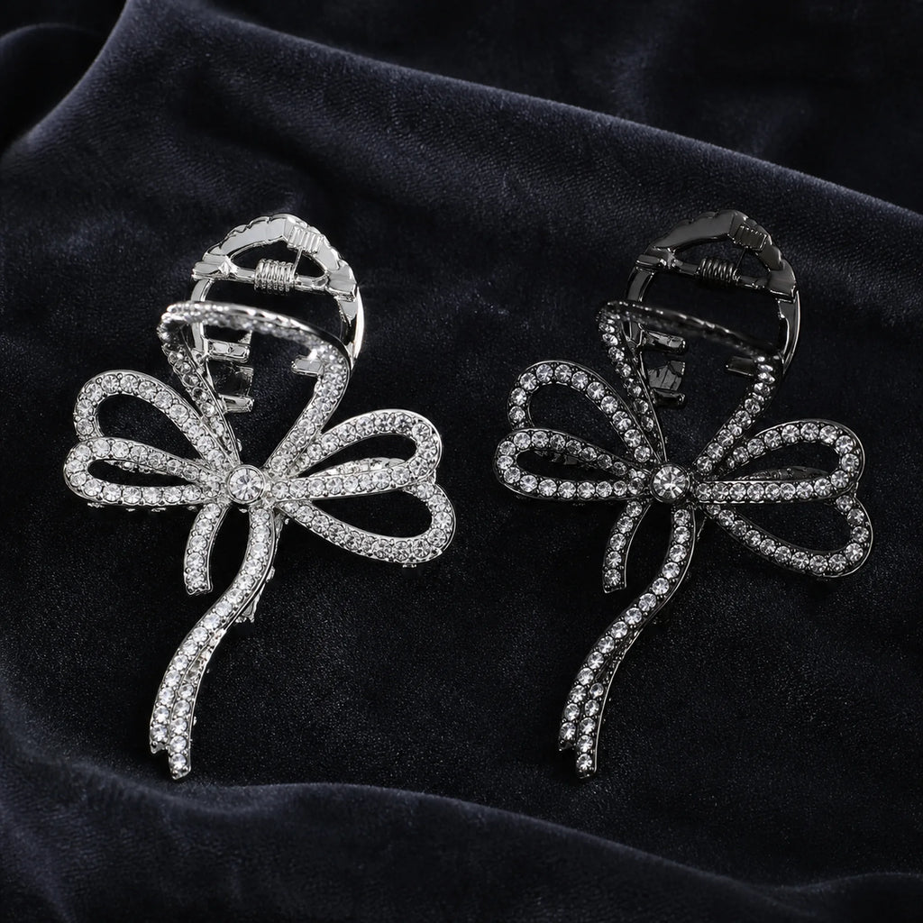 Selunyra silver and black rhinestone butterfly bow claw clips