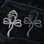 Selunyra silver and black rhinestone butterfly bow claw clips