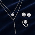 Selunyra Y necklace, halo earrings and open ring set