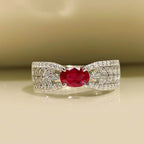 Selunyra Zeus Ring with oval ruby-red stone and leaf motif